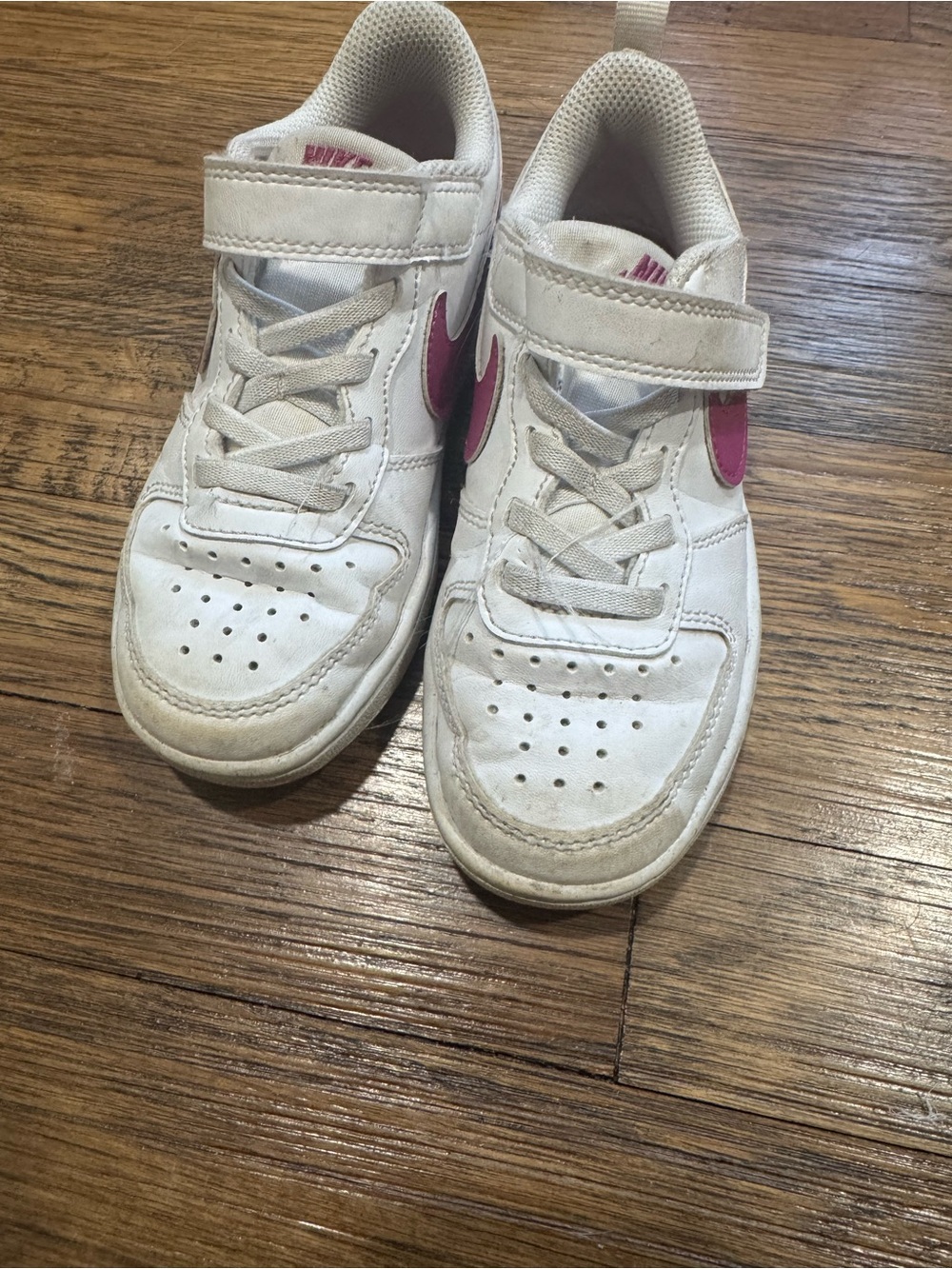 Nike Kids White Sneakers with Pink Swoosh Accent